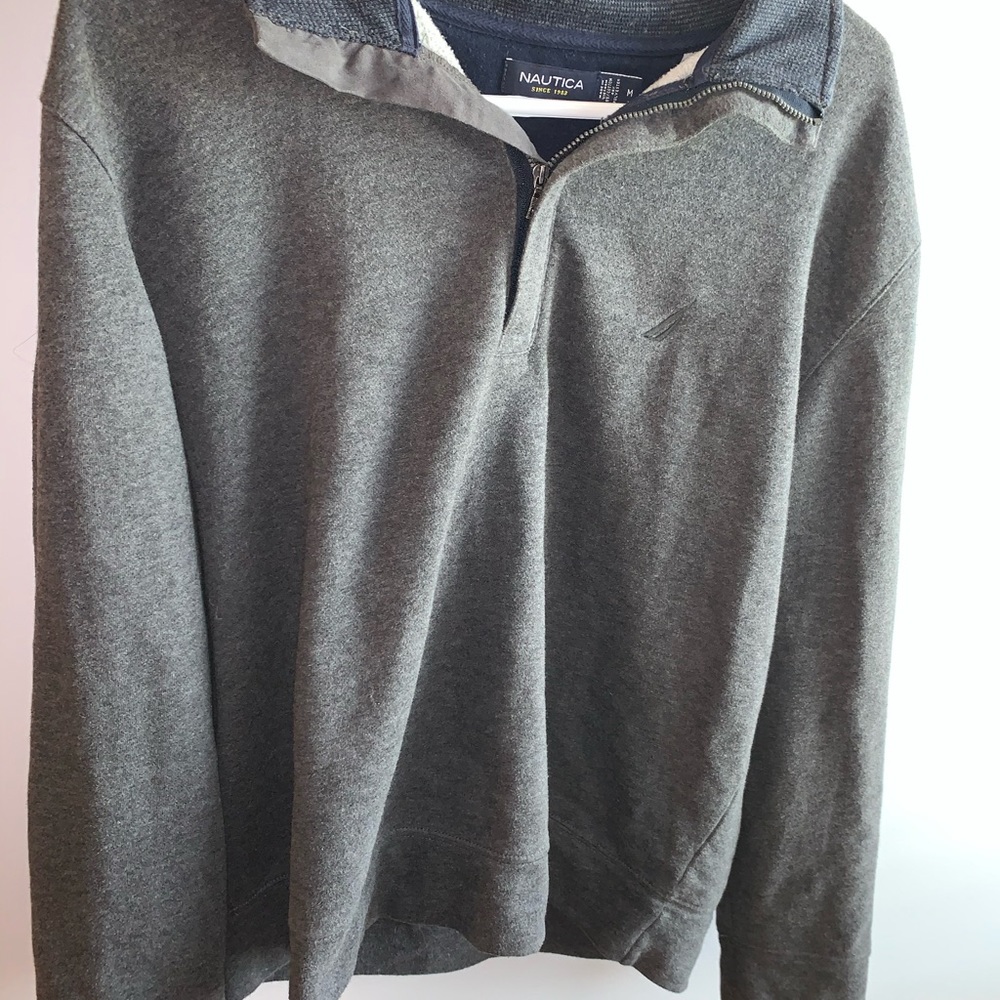 Dark Grey crewneck sweater.